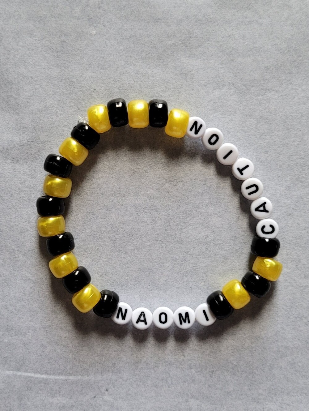 WWE Naomi Caution Bead Bracelet